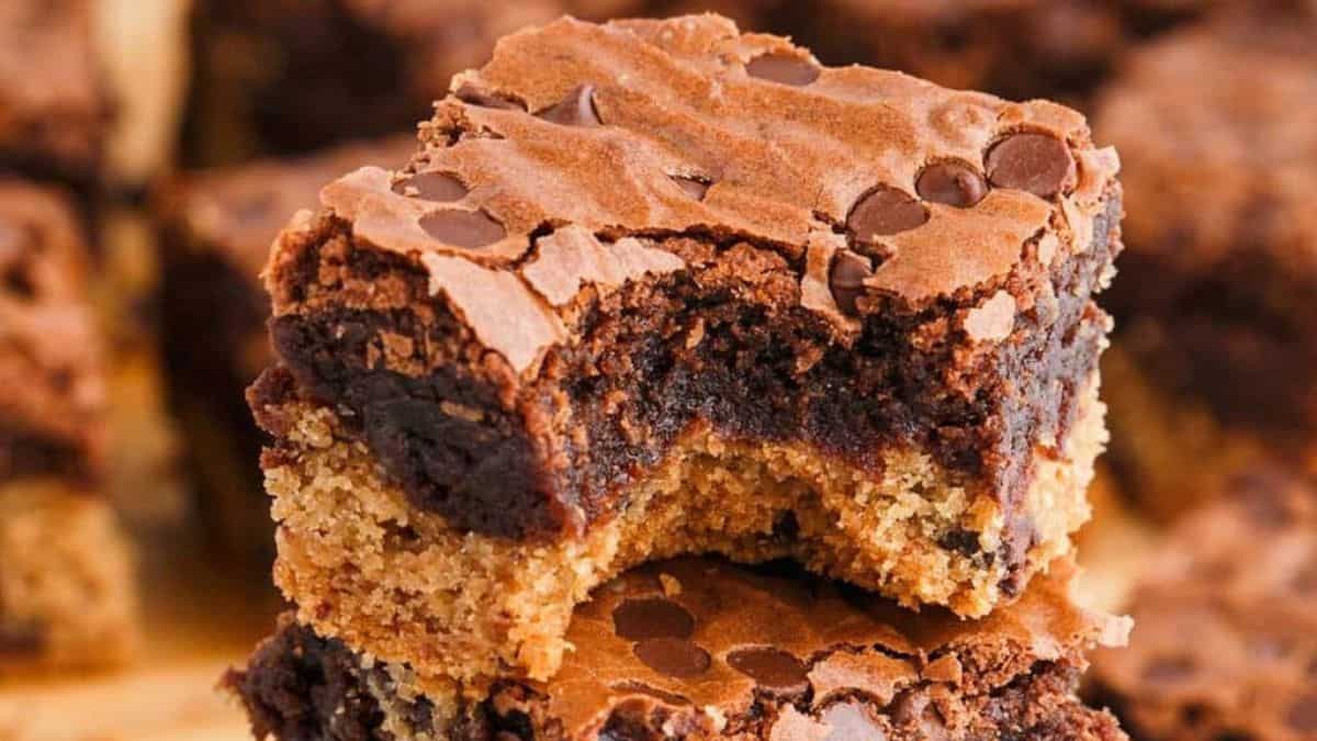A perfect bite of chocolate chip cookie brownie bars.
