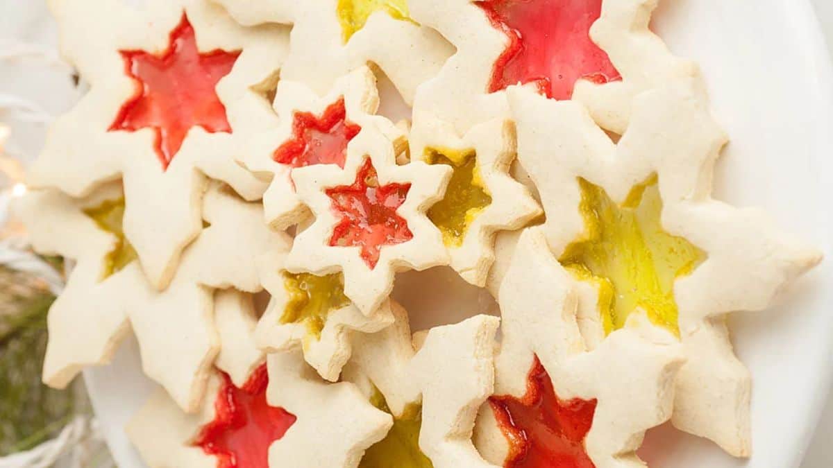 A plate of stained glass Christmas cookies