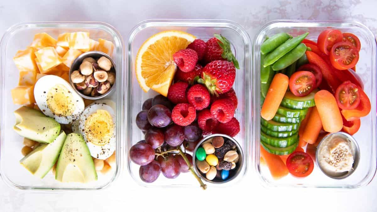 Different healthy meal prep snacks in a lunch box.