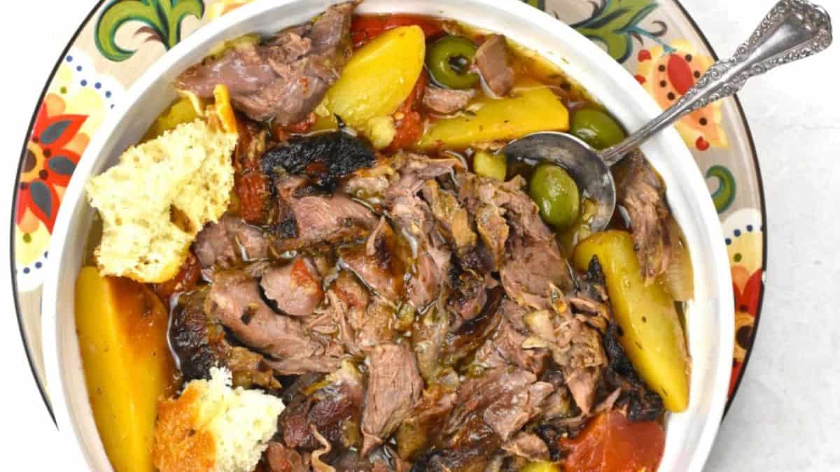 Beautifully plated kleftiko or Greek lamb cooked in Parchment.