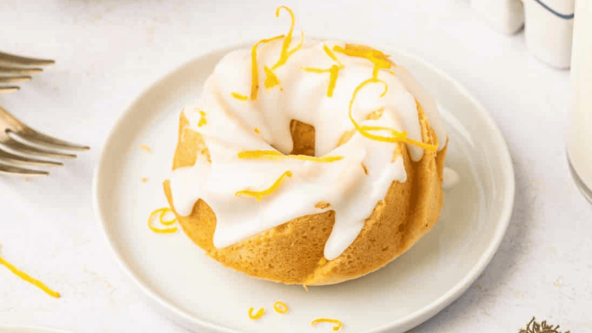 Beautifully plated lemon mini bundt cake.