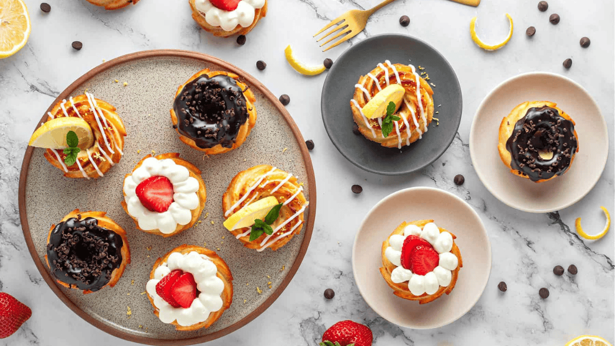 Mini bundt cakes with assorted toppings.