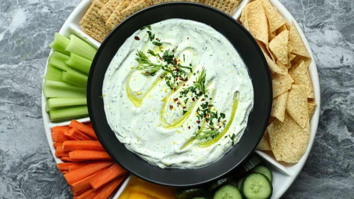 Beautifully plated bowl of ranch cottage cheese dip.