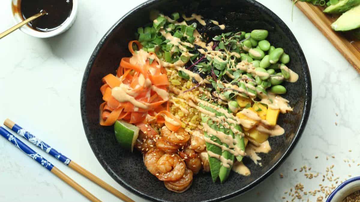 Beautifully plated bowl of shrimp poke bowl.