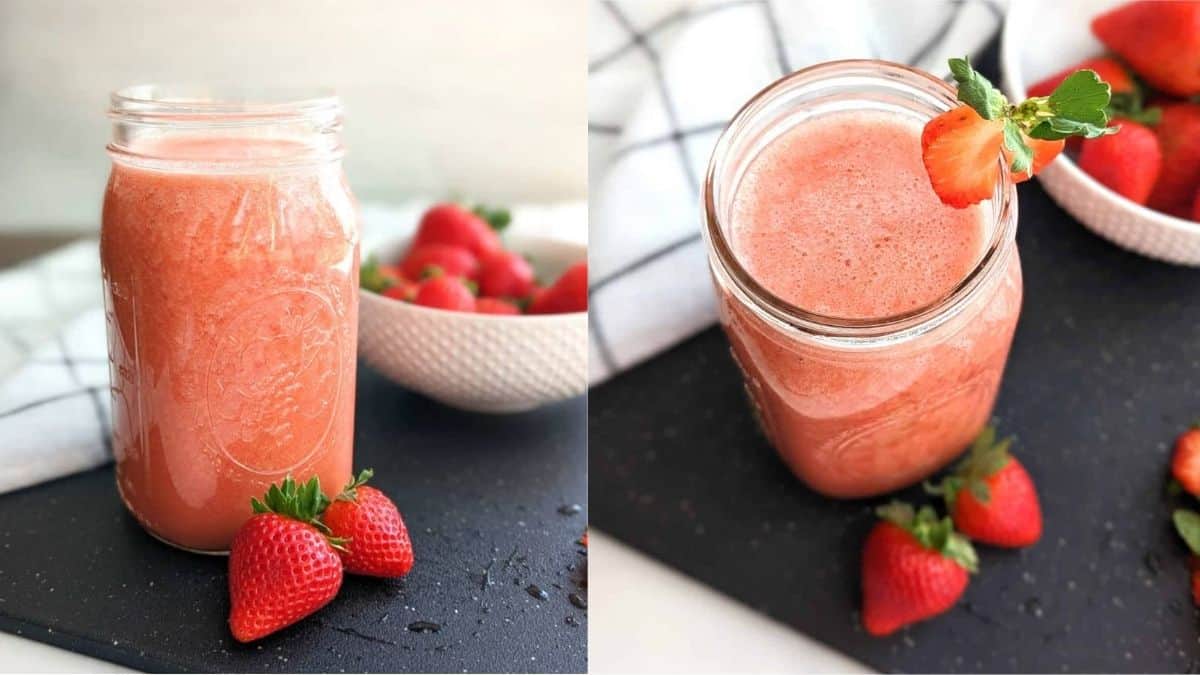 A glass of strawberry with fresh strawberry as the garnish.