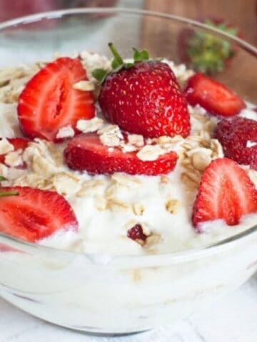 bowl of greek yogurt and strawberries