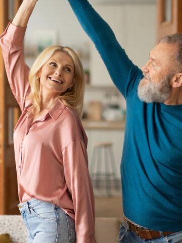 couple dancing in the living room