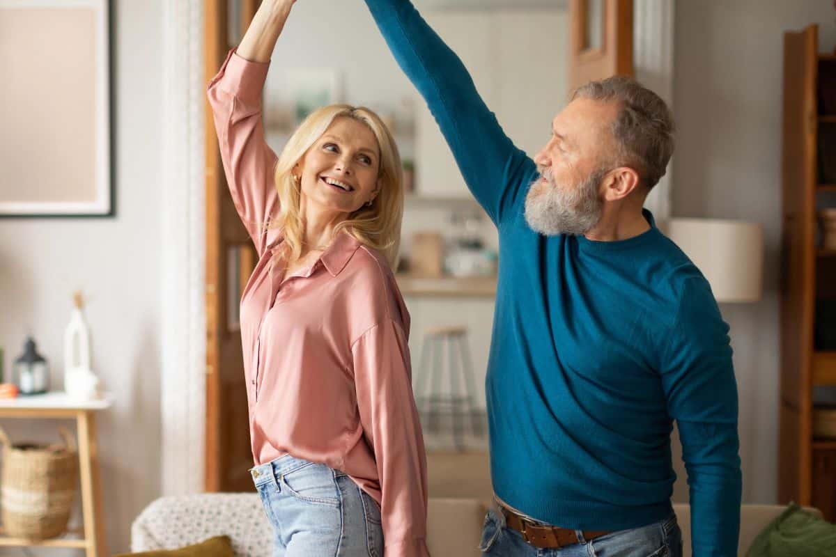 couple dancing in the living room