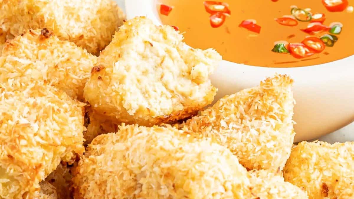 Crispy gluten free coconut tofu with vinegar sauce on the side.