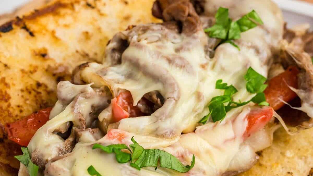 Philly cheesesteaks on a toasted bun.