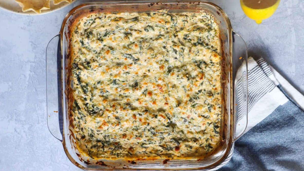 A casserole of warm crab spinach dip.