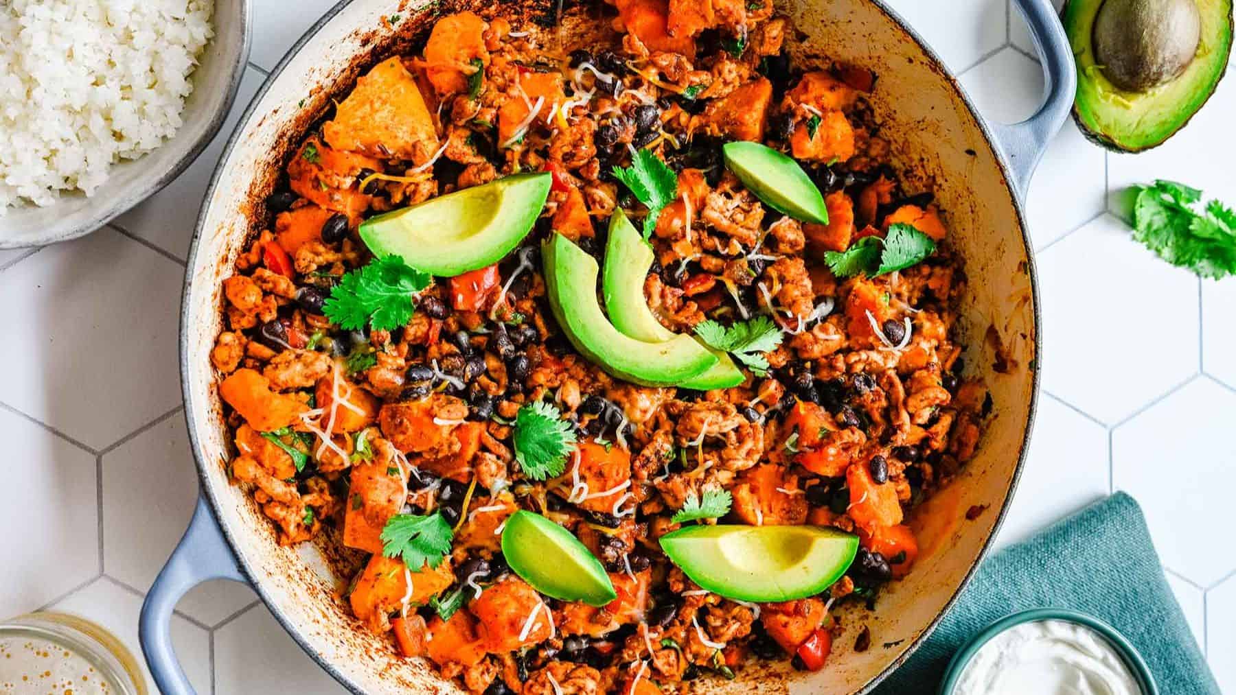 Ground turkey sweet potato skillet with avocado.