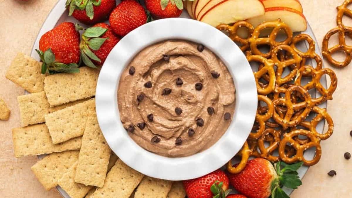 Indulgent brownie batter dip with chocolate chips on top.