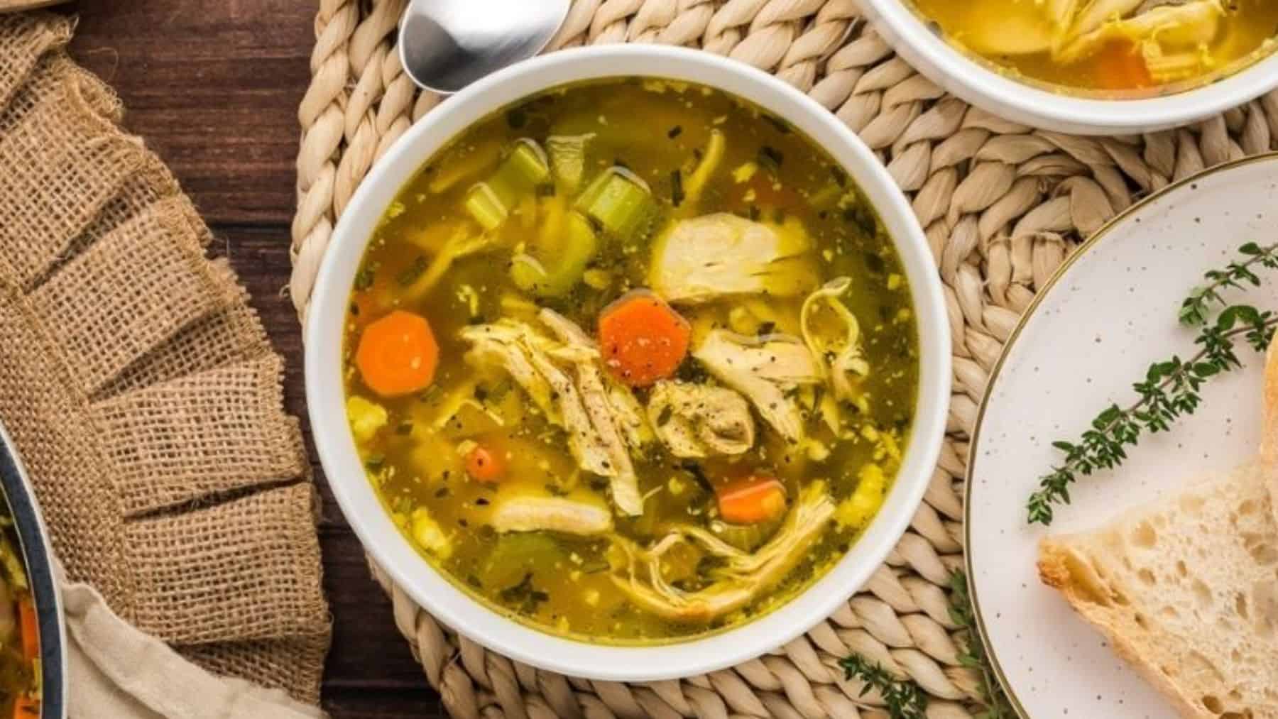 A bowl of hot homemade chicken lemon soup.