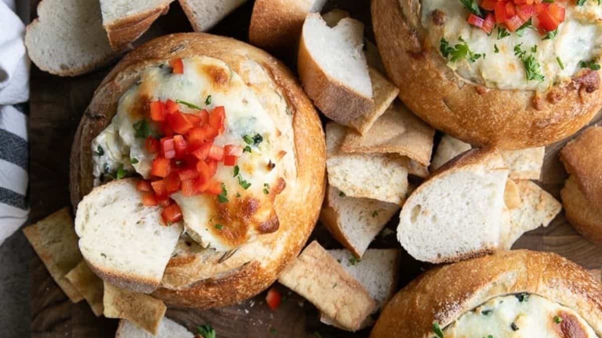 Hot crab artichoke dip in a bread bowl.