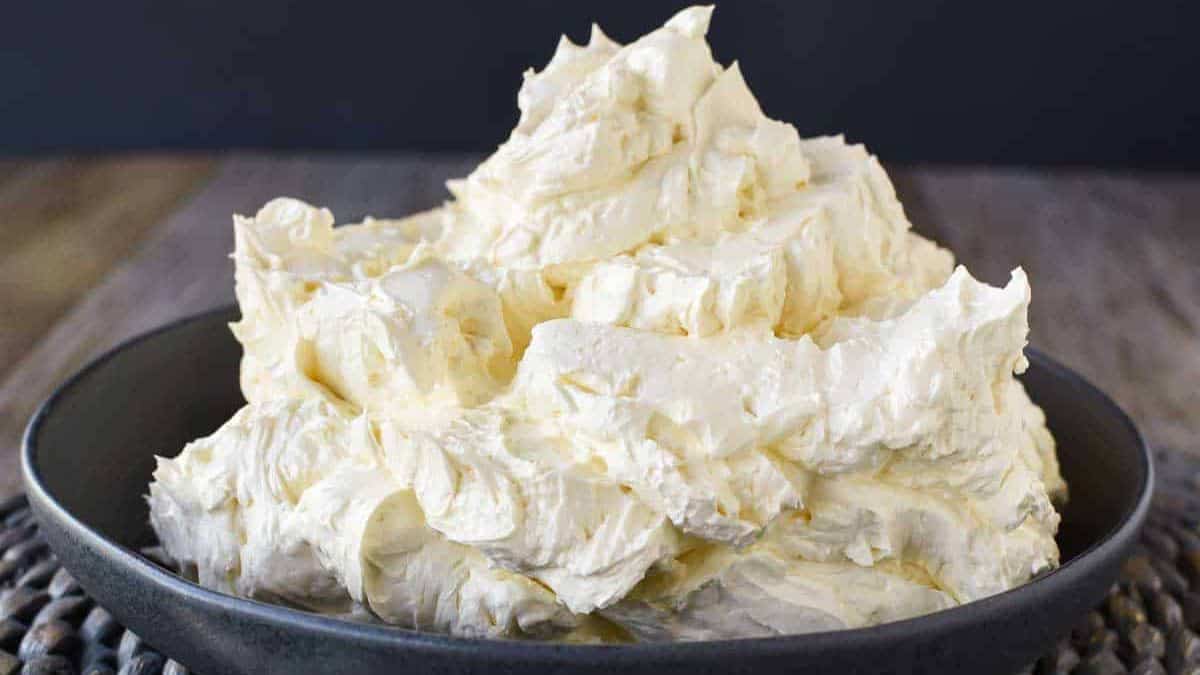 Italian meringue buttercream in a black plate