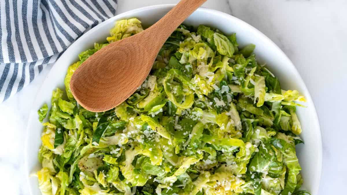 A bowl of freshly made parmesan Brussels Sprouts salad.