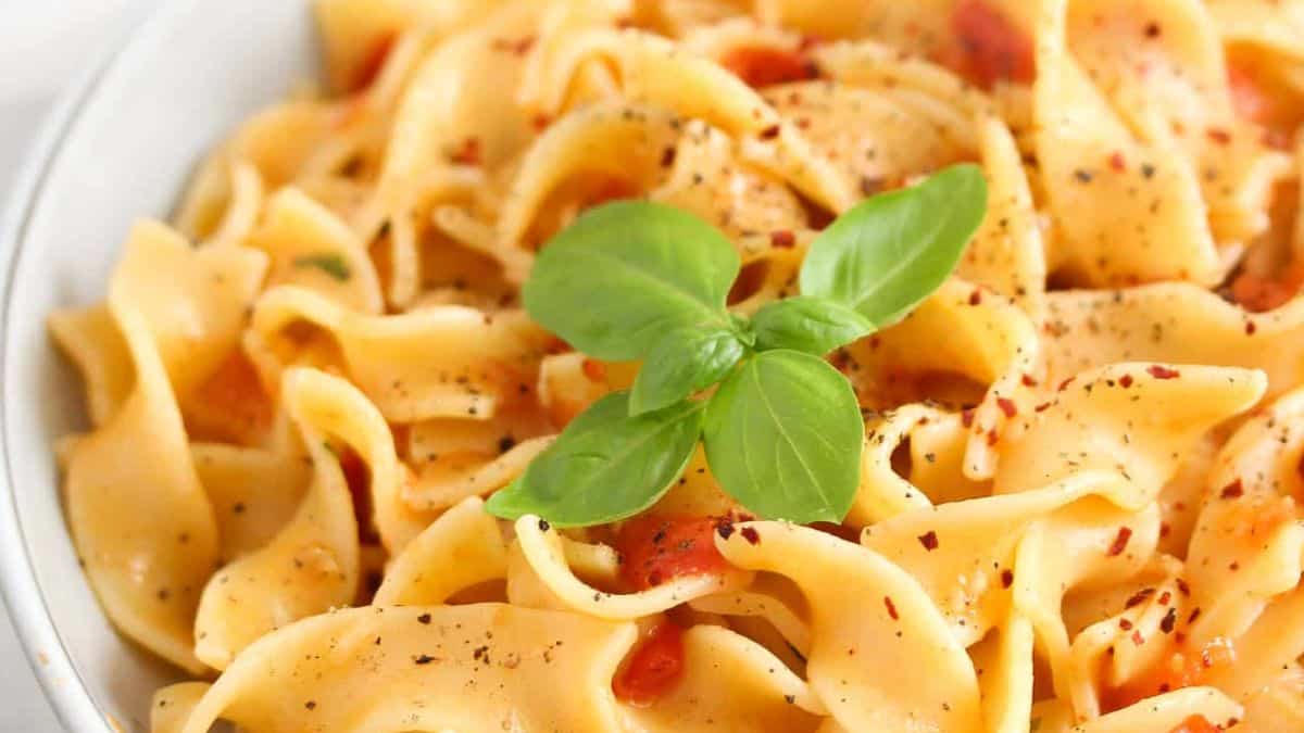 Gorgeously plated pasta in coconut milk sauce.