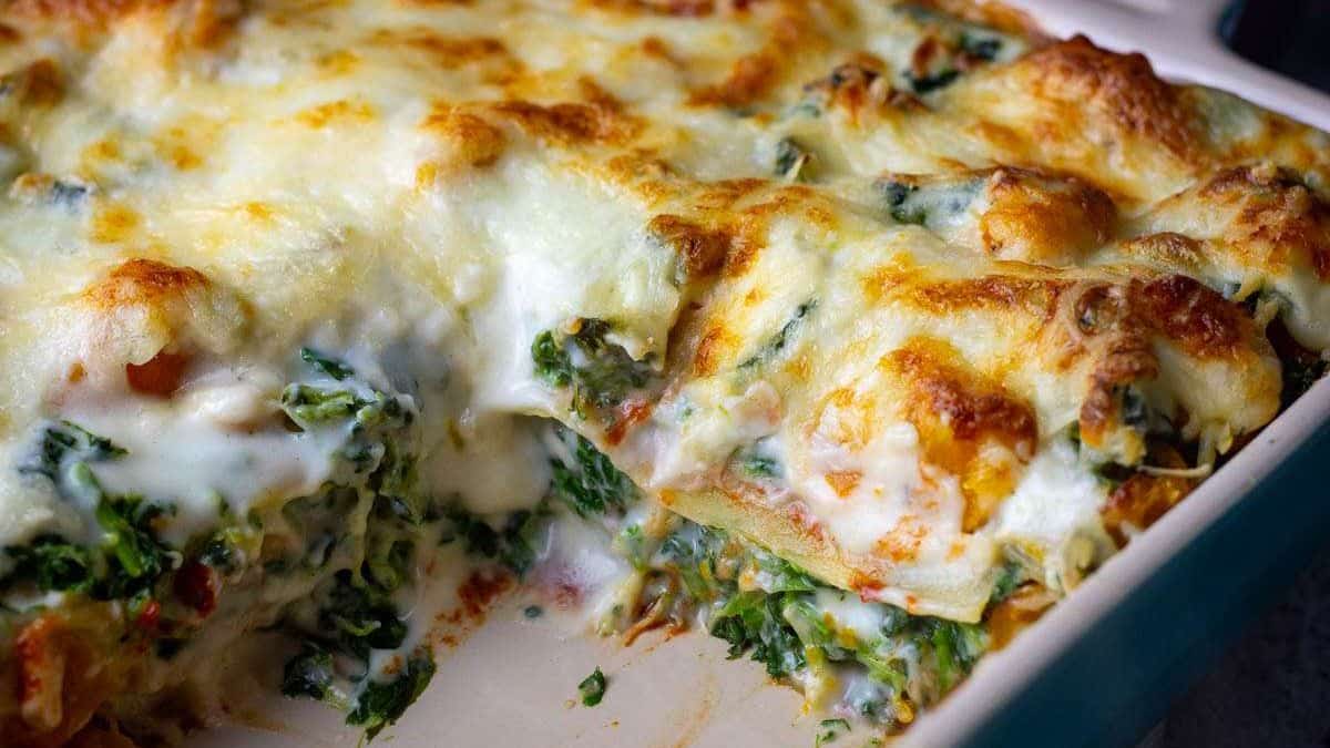 Roasted butternut squash and spinach lasagna in a casserole