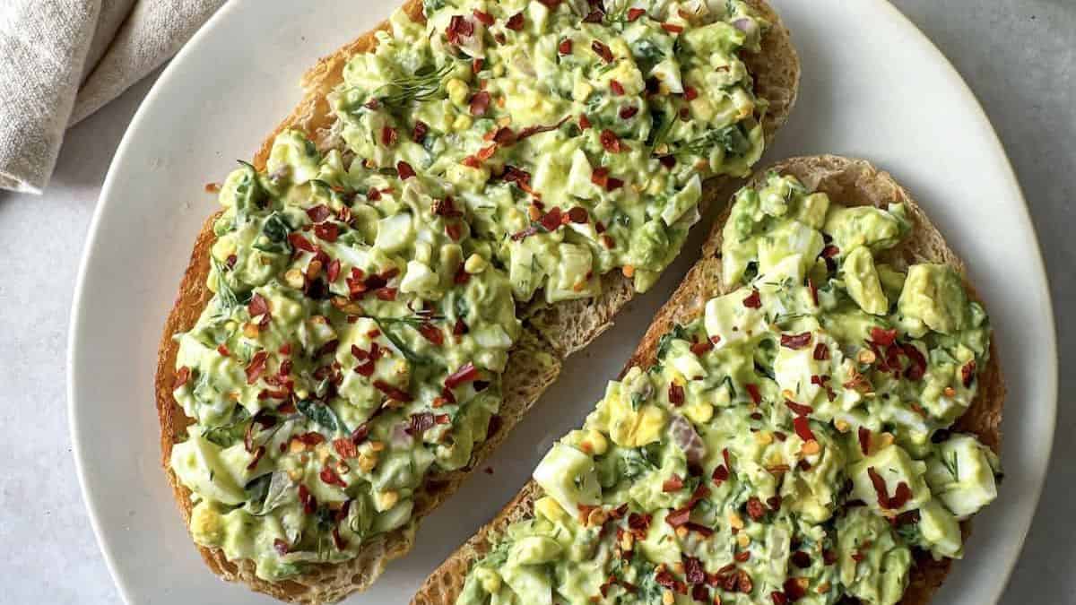 Avocado toast with egg and chili flakes