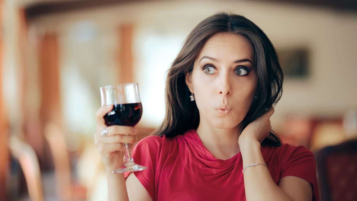 confused woman with wine