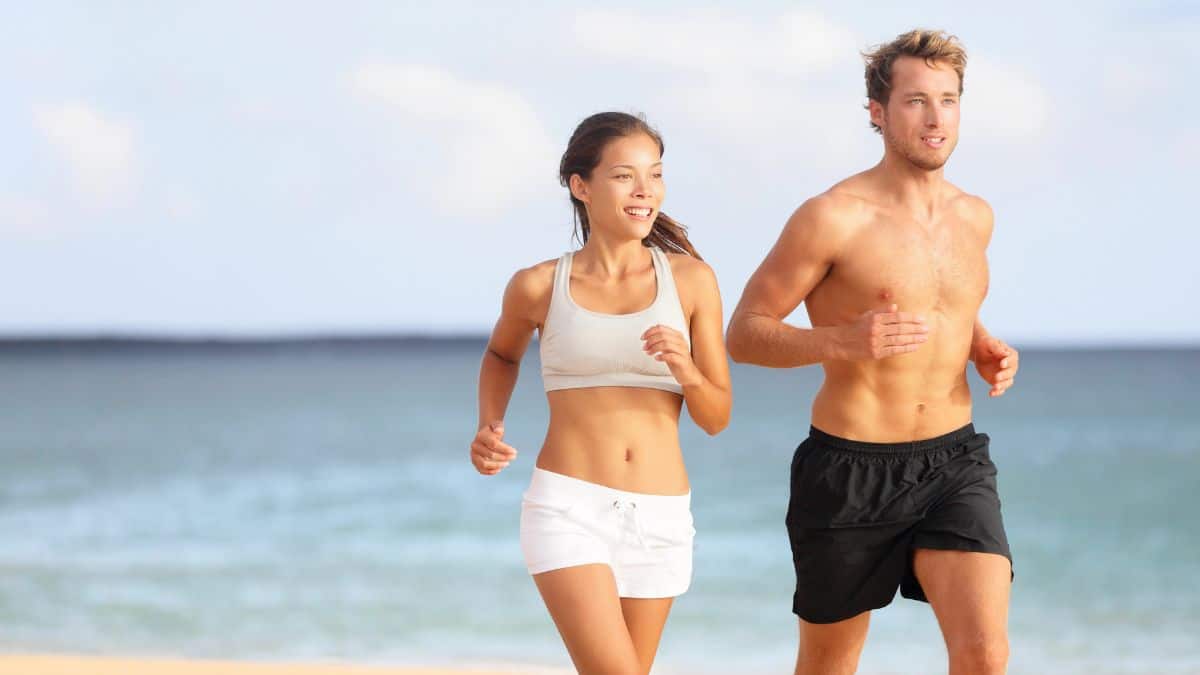 couple running on beach