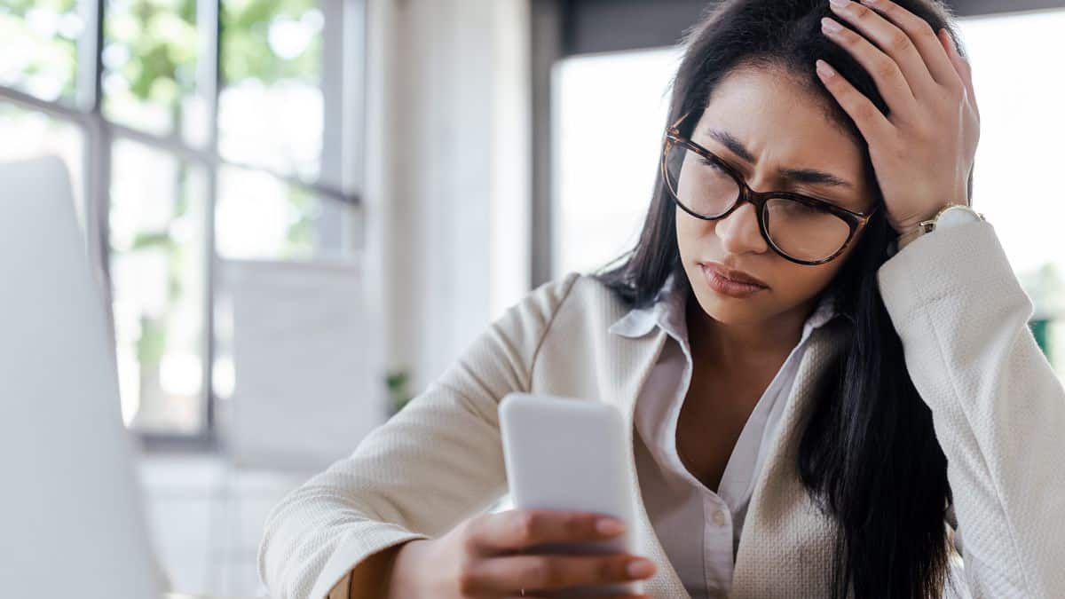frustrated woman on phone