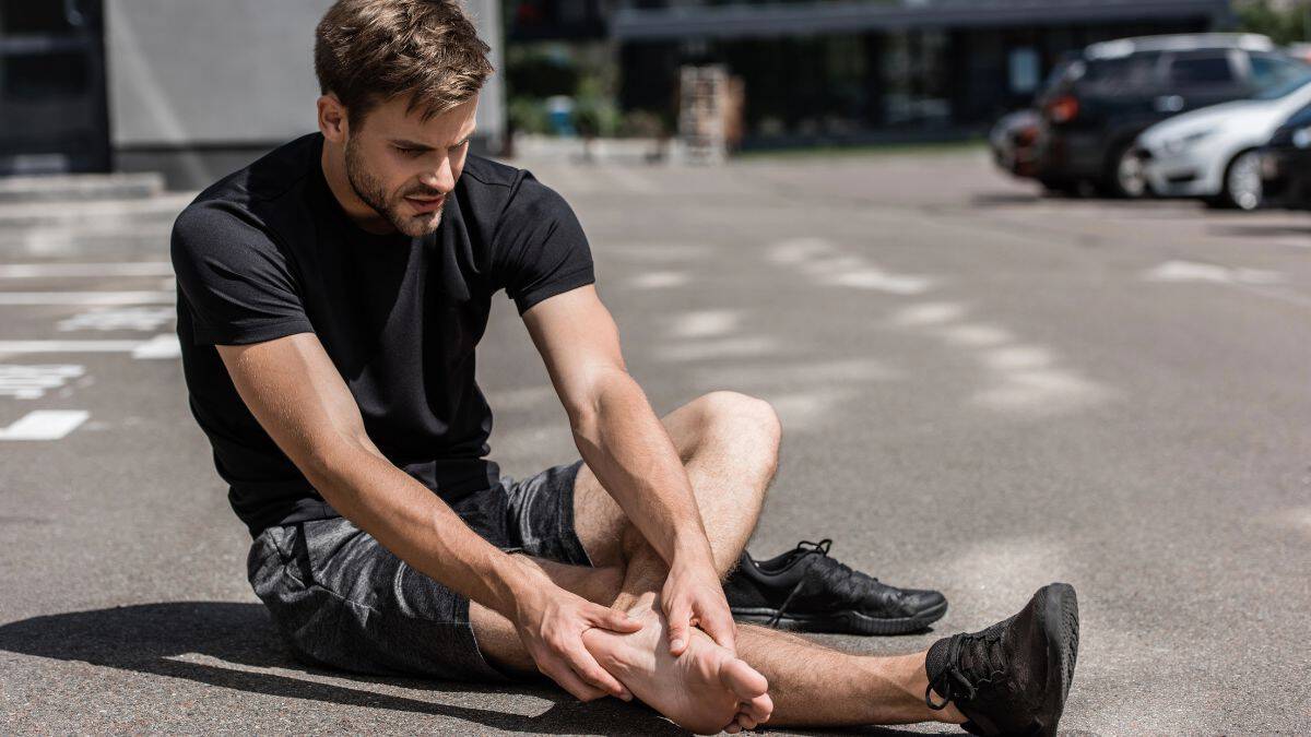 man with painful ankle