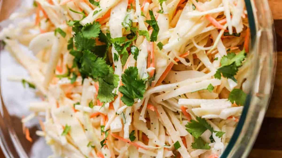A bowl of jicama cilantro coleslaw. 