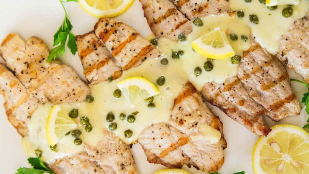 A serving of creamy lemon tilapia in a plate. 