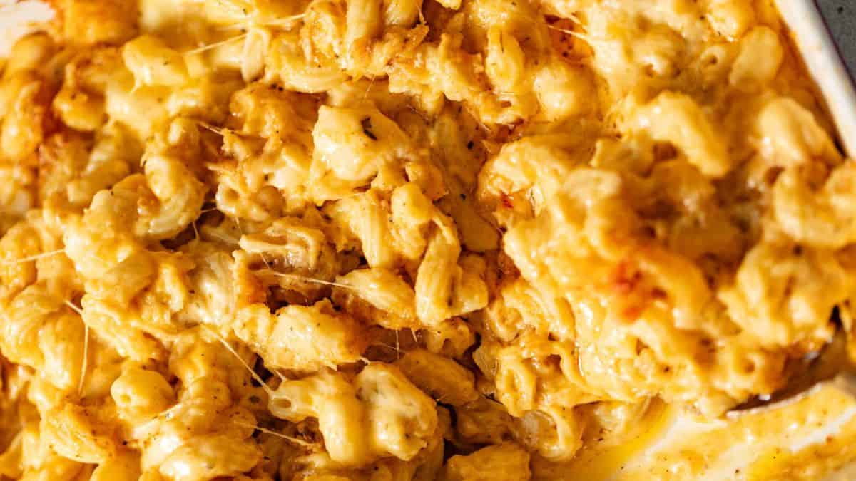 Creamy lobster mac and cheese in a casserole.