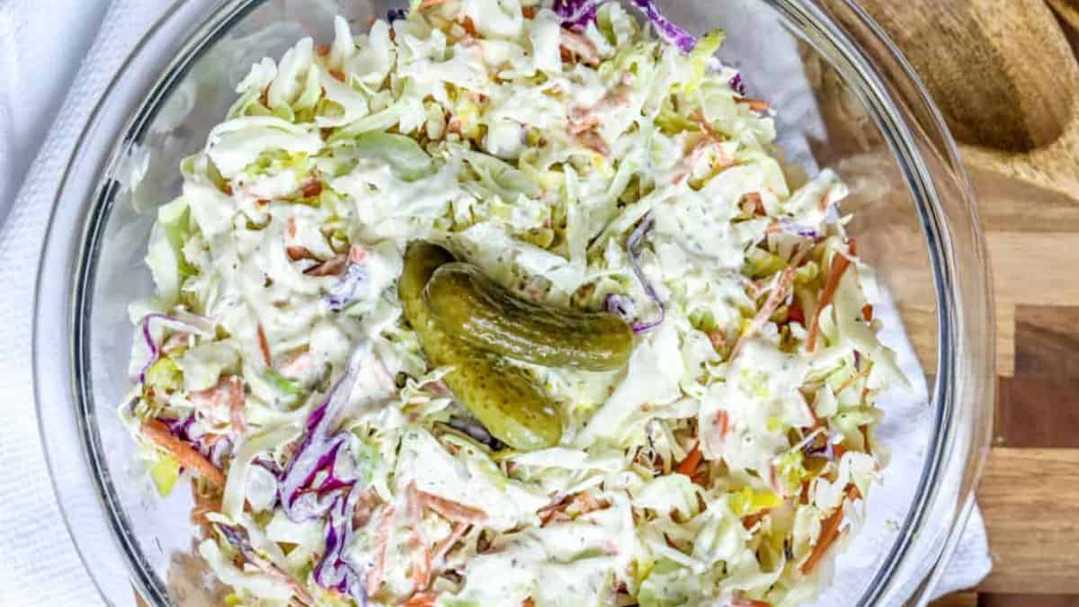A bowl of dill pickle coleslaw.