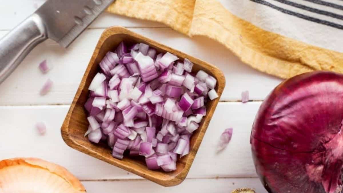 A bowl fried diced onions.