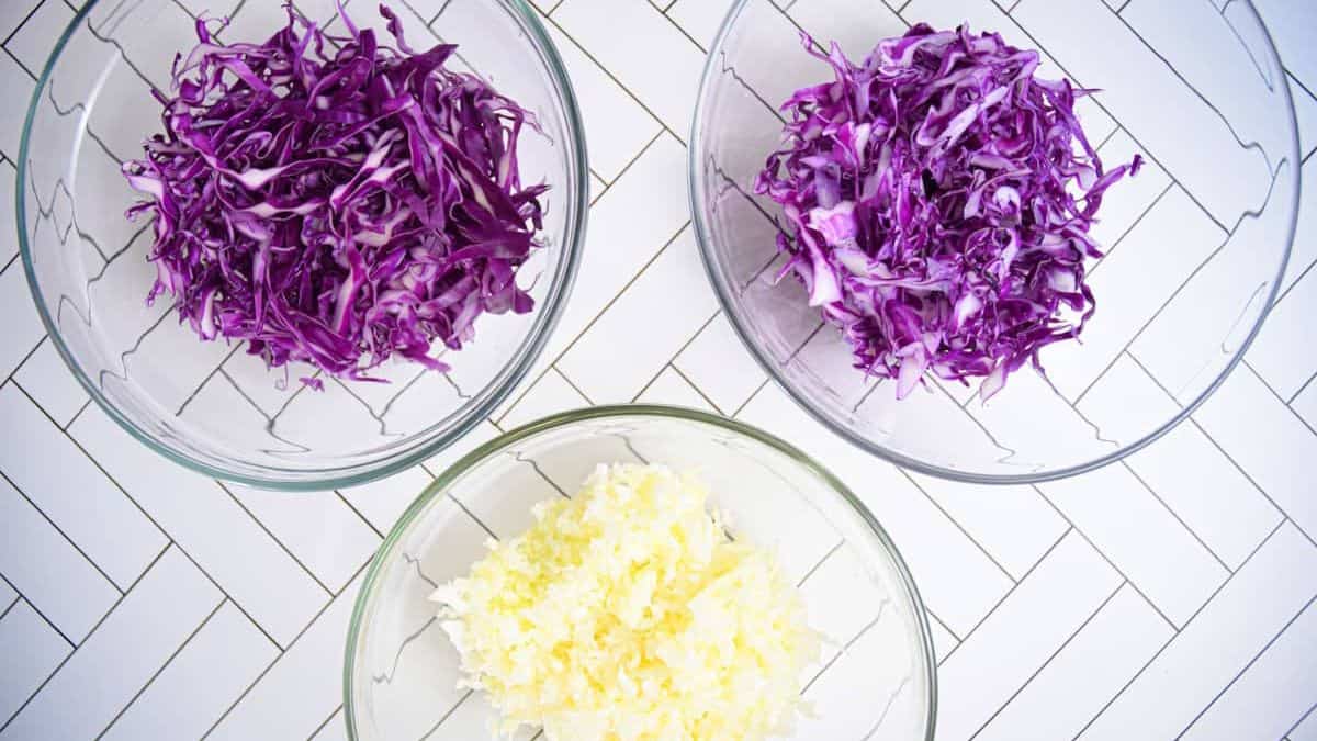 3 bowls of shredded cabbage. 