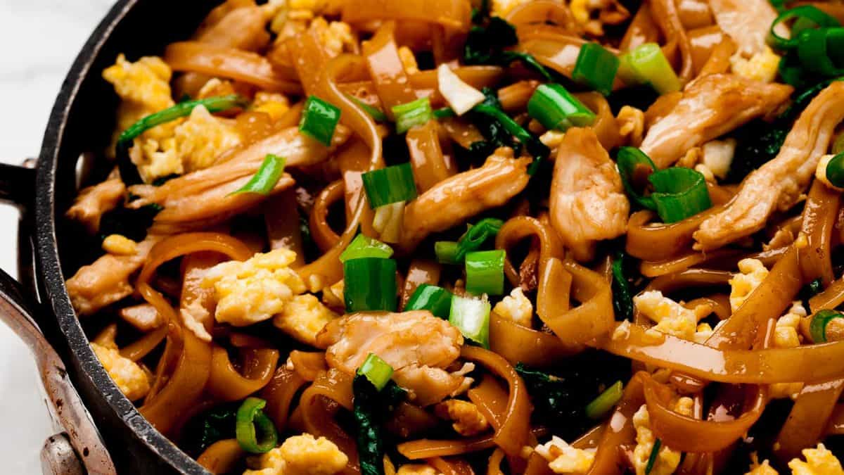 Pad see eww in a wok.