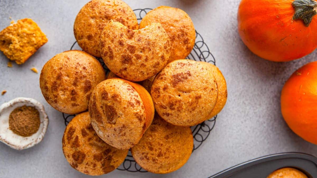 Freshly baked pumpkin cornbread muffin.