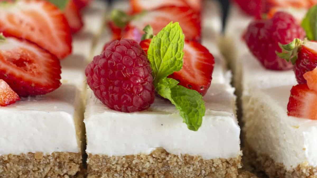 A few pieces of strawberry cheesecake bars. 