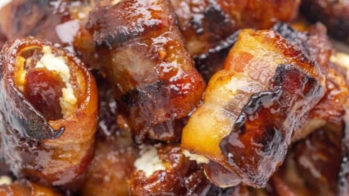 A close-up shot of bacon-wrapped dates. 