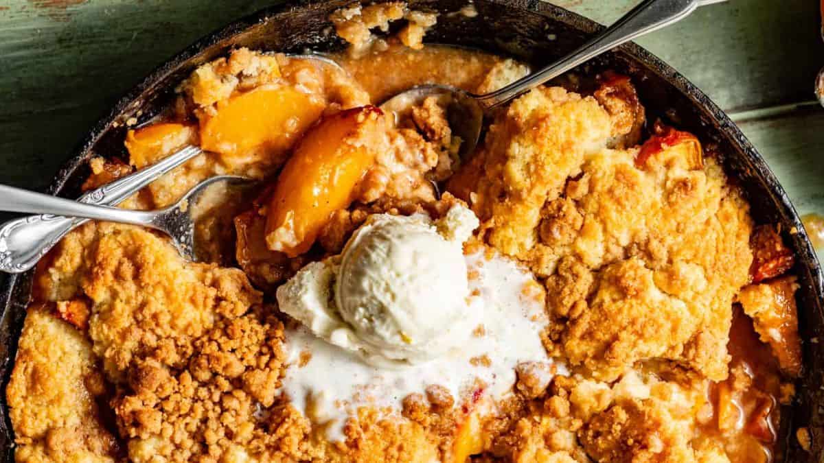 Peach cobbler in a skillet,