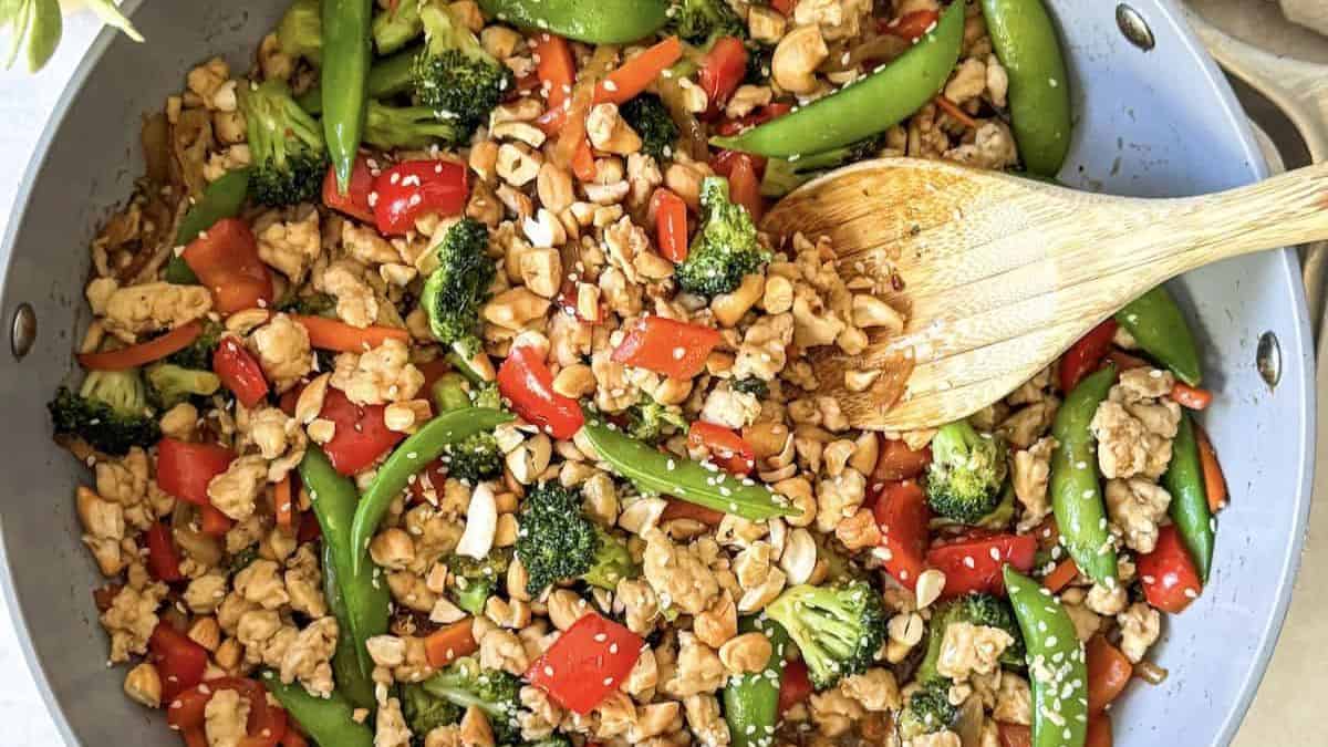 A pot-full of ground chicken stir fry.