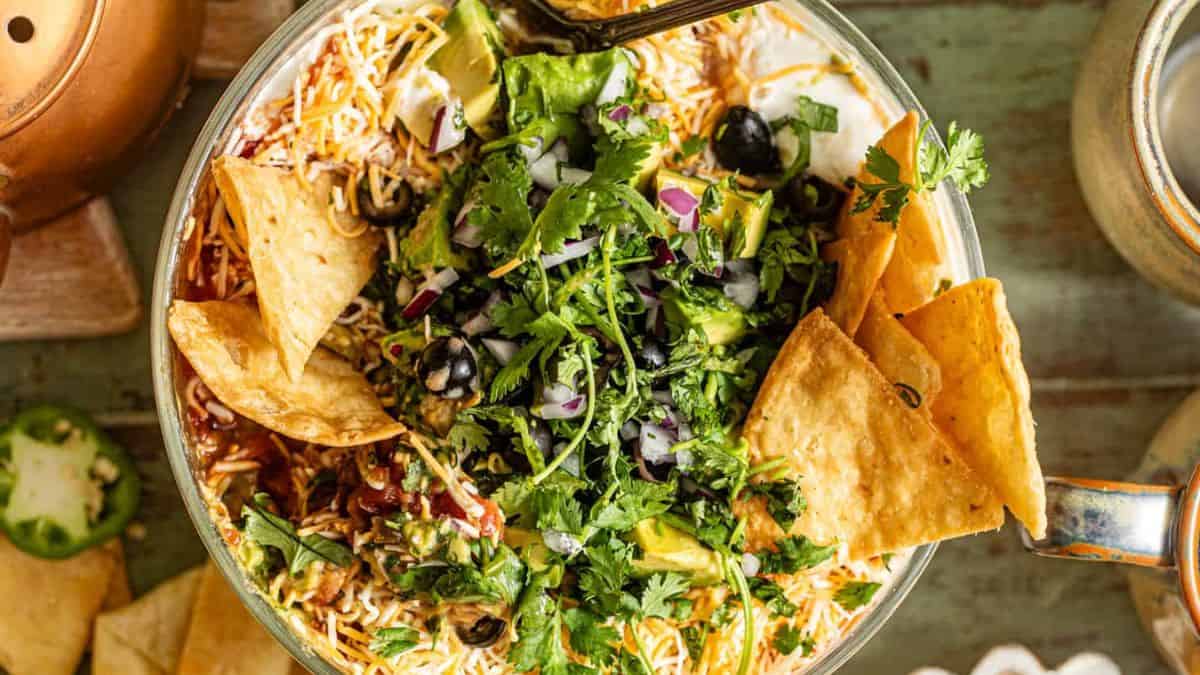 Five Layer Dip served in a bowl.