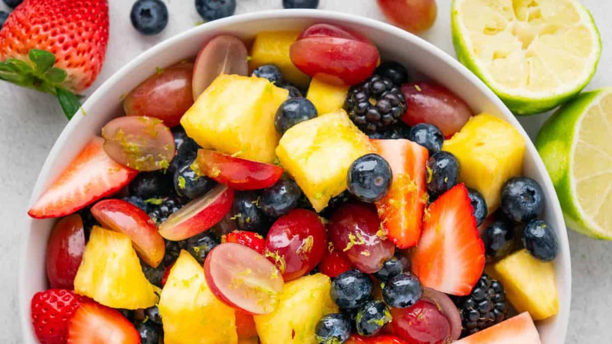 A bowl of honey lime fruit salad.