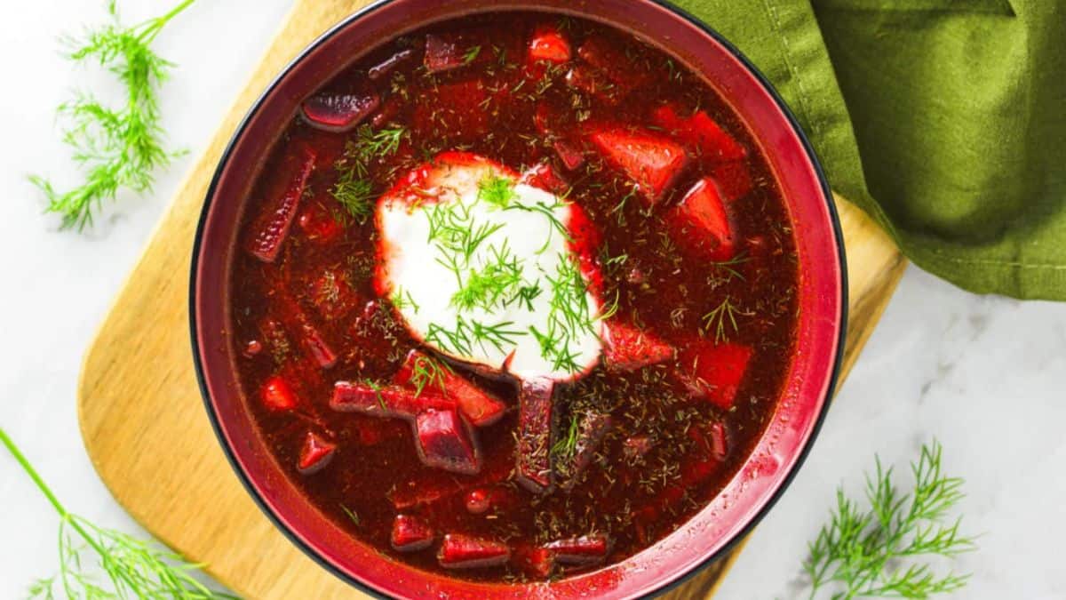 A serving of borscht in bowl. 