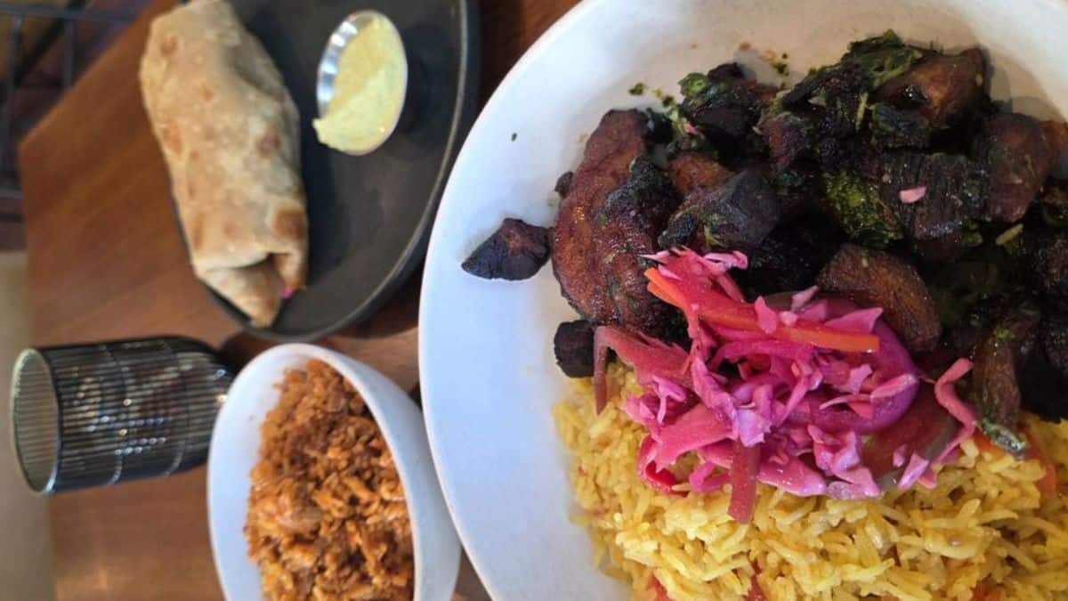 Jollof Rice, Goat Roti, and Griot