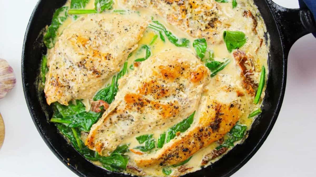 one pan creamy Tuscan chicken in a skillet pan.