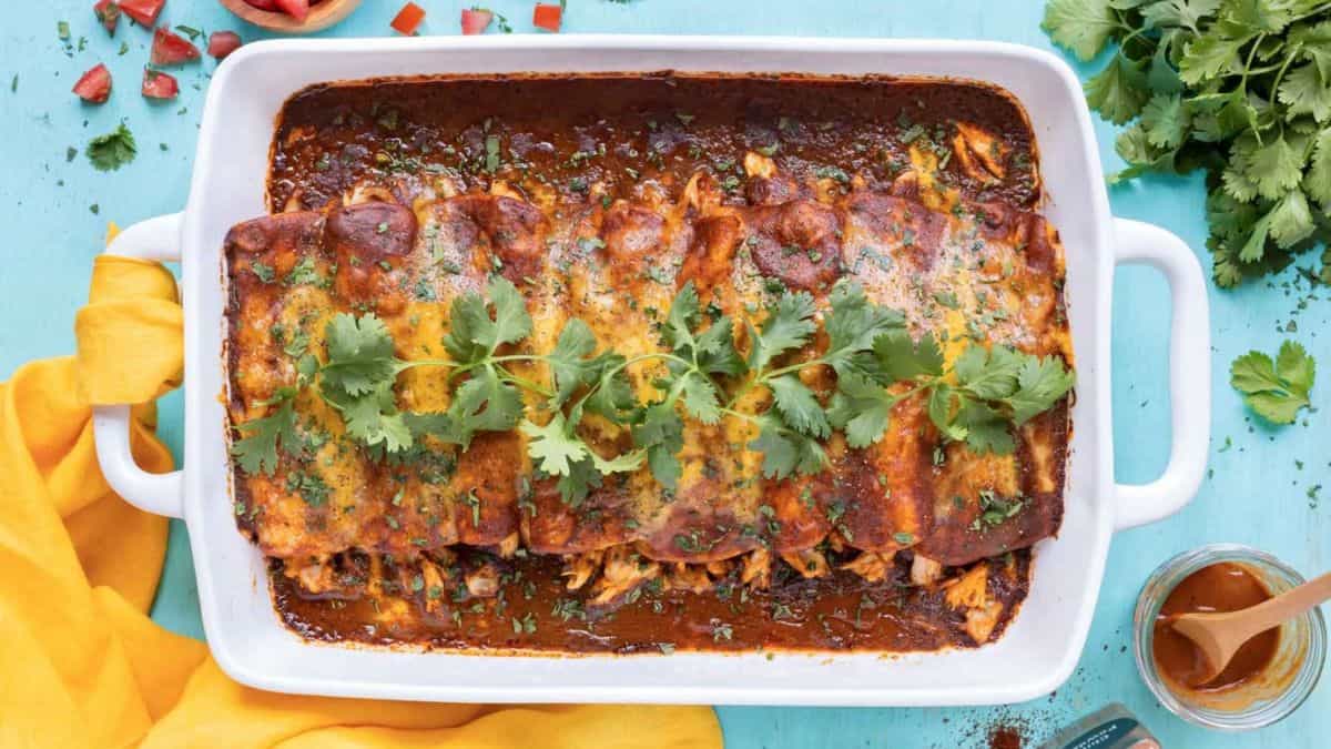 Rotisserie Chicken Enchiladas with Corn Tortillas in a baking dish. 