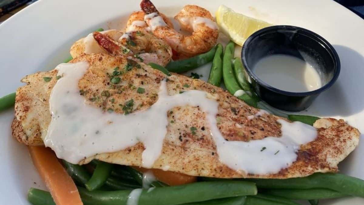 Flounder, scallops, and shrimp, seasoned vegetables and mashed potato's, outstanding. Vodka Martini, optional.