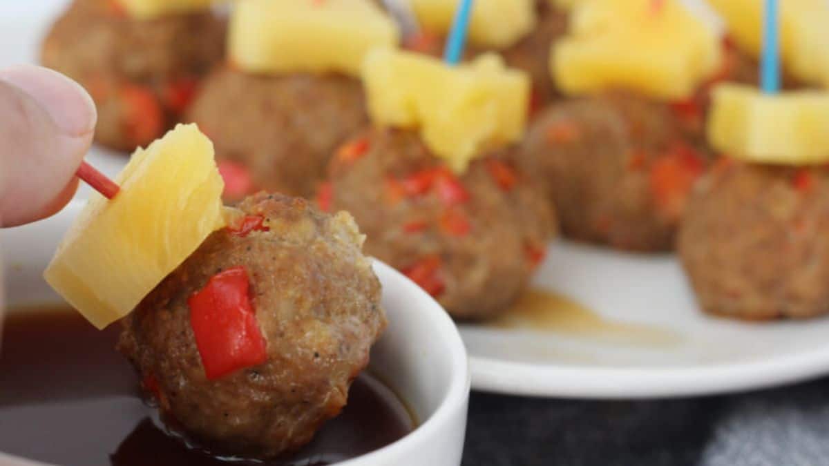 Spicy Hawaiian Turkey Meatballs served on a plate with a dip.