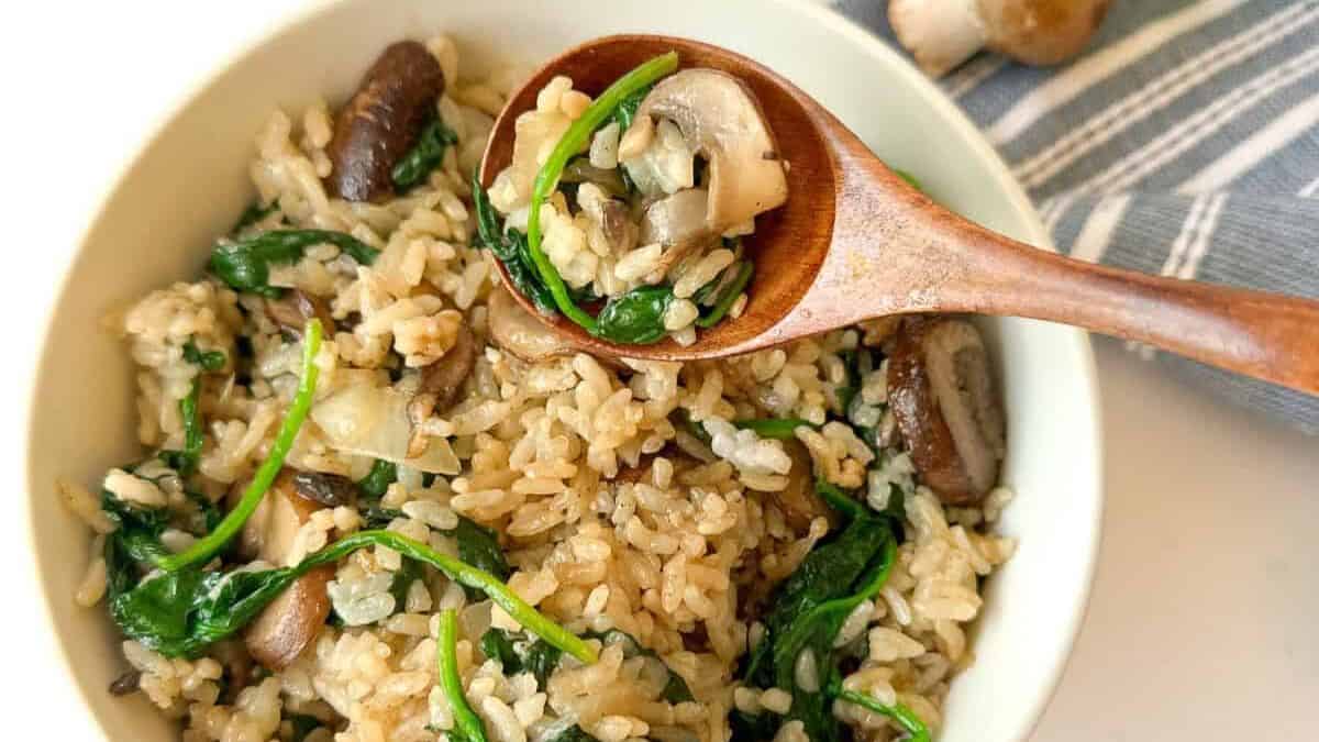 A bowl of spinach mushroom rice.