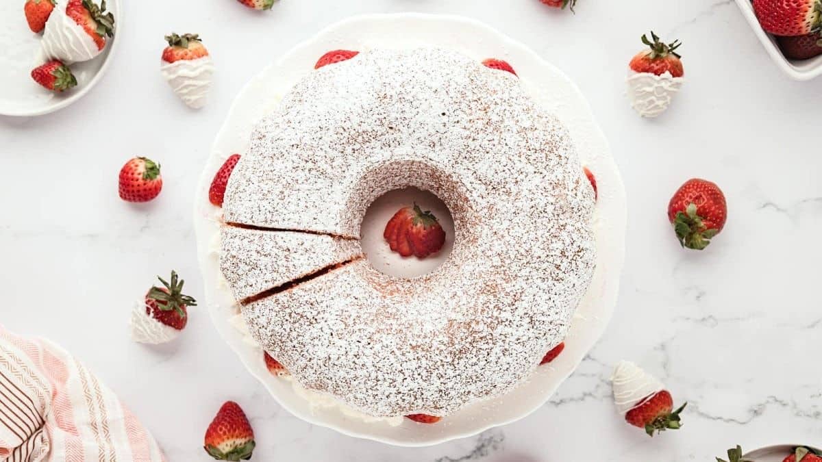 Strawberry Bundt Cake served on a cake plate.
